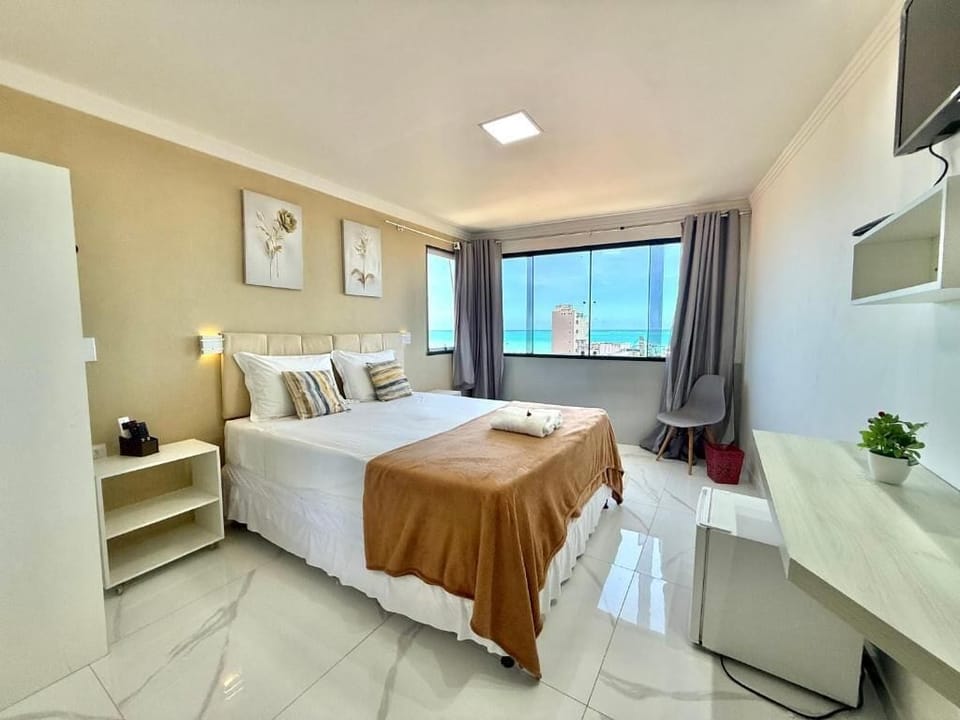 Deluxe Double Room, Partial Sea View | Iron/ironing board, free WiFi