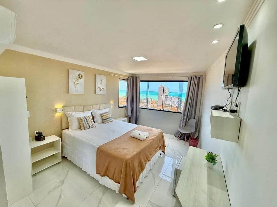 Deluxe Double Room, Partial Sea View | Iron/ironing board, free WiFi