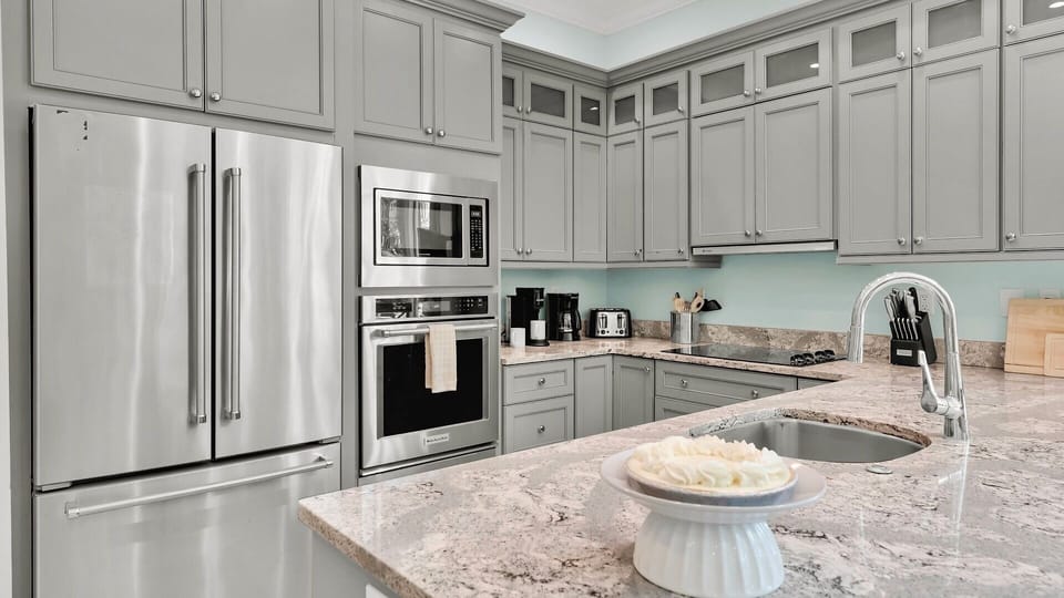 Your fully-equipped kitchen features stainless steel appliances...