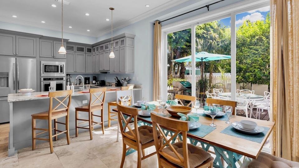 The open kitchen and dining space where you'll love gathering for meals and conversation...