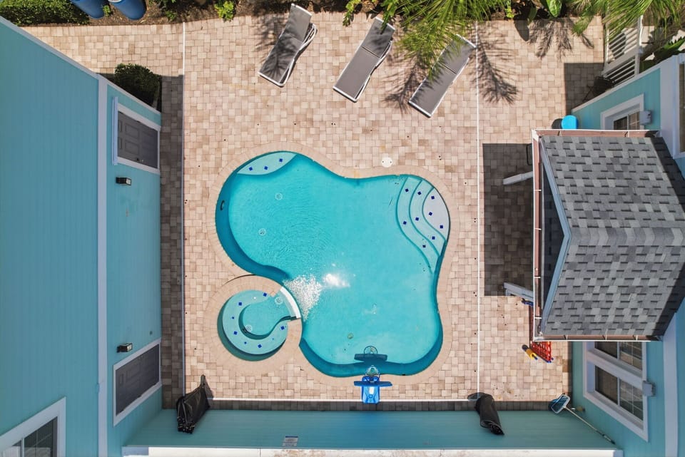 A bird's-eye view of your private outdoor oasis tucked behind the home.