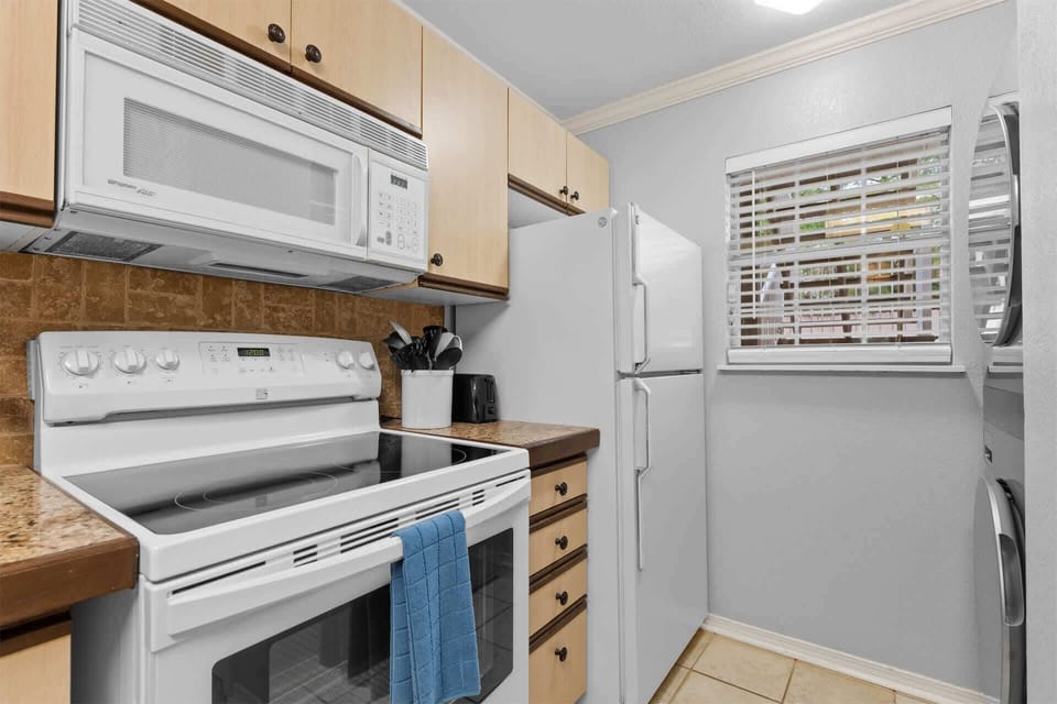 The open kitchen is well equipped for an unforgettable getaway​