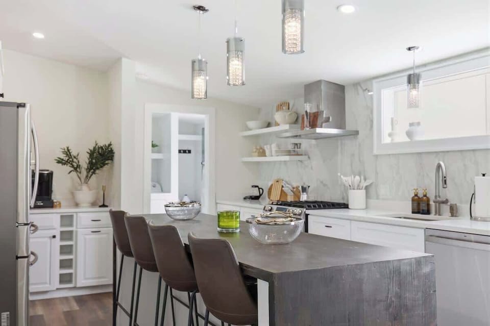 Prep a gourmet meal in our HGTV-inspired space with marble accents.