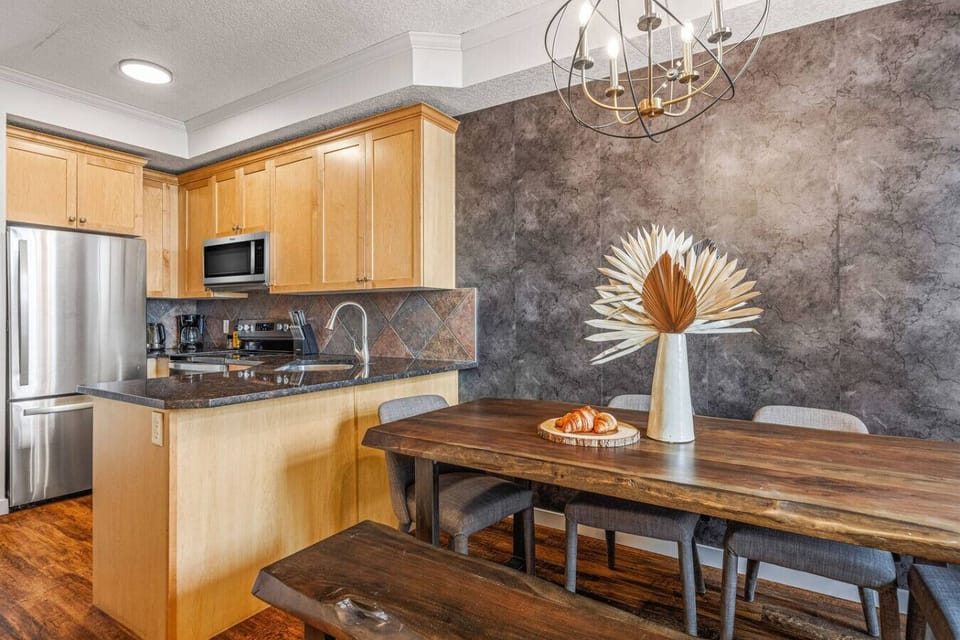 Full kitchen with complimentary coffee, coffee maker, cookware and utensils perfect for making home-cooked meals for the family