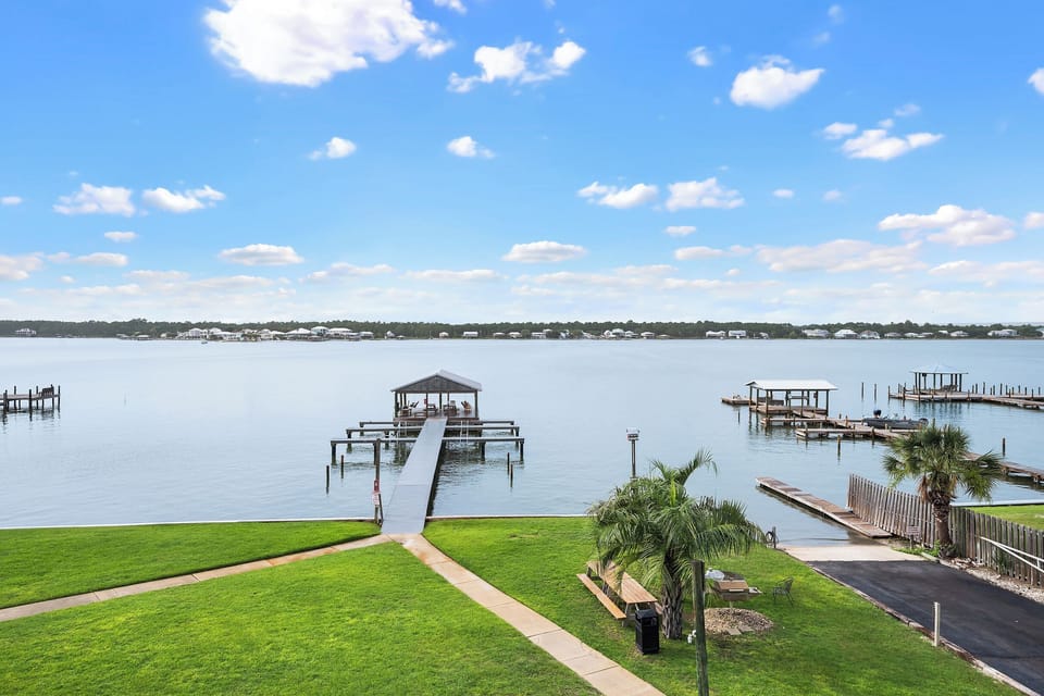 Little Lagoon at your doorstep, with the covered fishing pier and docks just steps from the condo