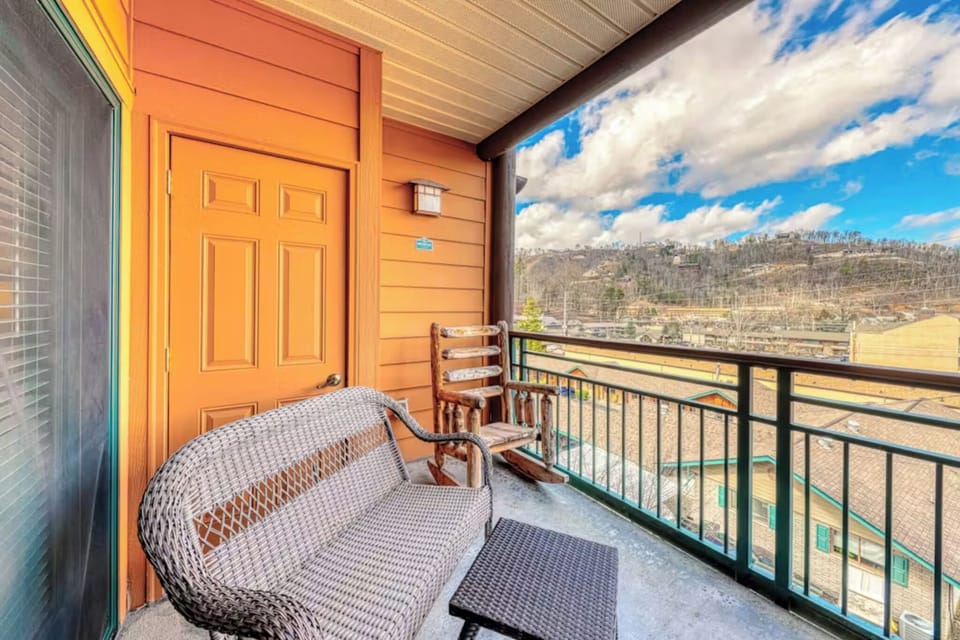 Step onto your private balcony and unwind in comfortable wicker seating while taking in stunning mountain vistas.