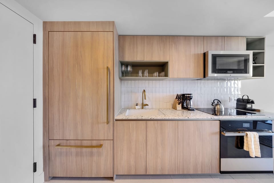 Condo, Balcony, City View | Private kitchen | Toaster, cookware/dishes/utensils, eco-friendly cleaning products