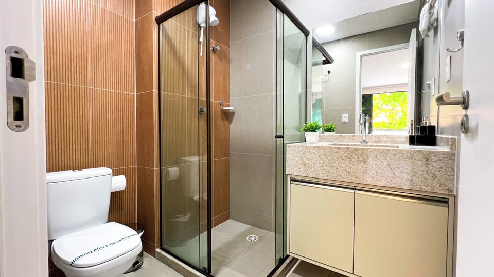 Comfort Apartment, Pool View | Bathroom | Shower, towels, toilet paper