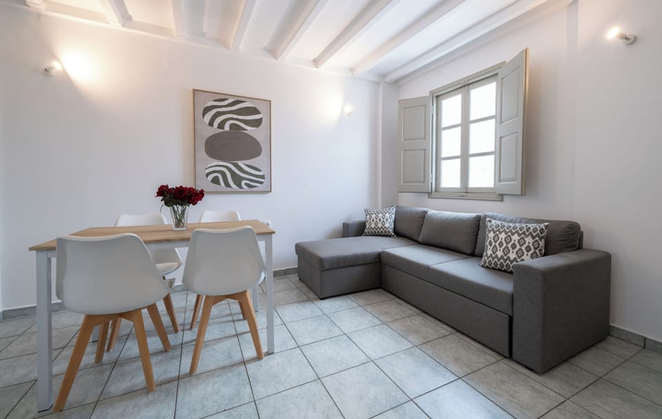 Premium Penthouse, Balcony, City View | Living area | 32-inch LCD TV with digital channels