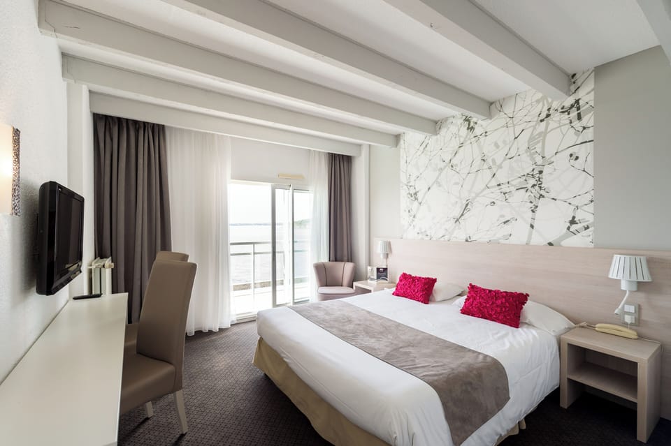 Family Room, Sea View (Duplex) | Desk, soundproofing, iron/ironing board, free WiFi