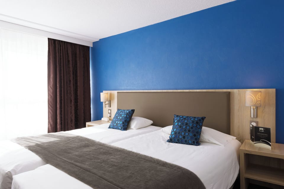 Comfort Twin Room, 2 Twin Beds, City View | Desk, soundproofing, iron/ironing board, free WiFi