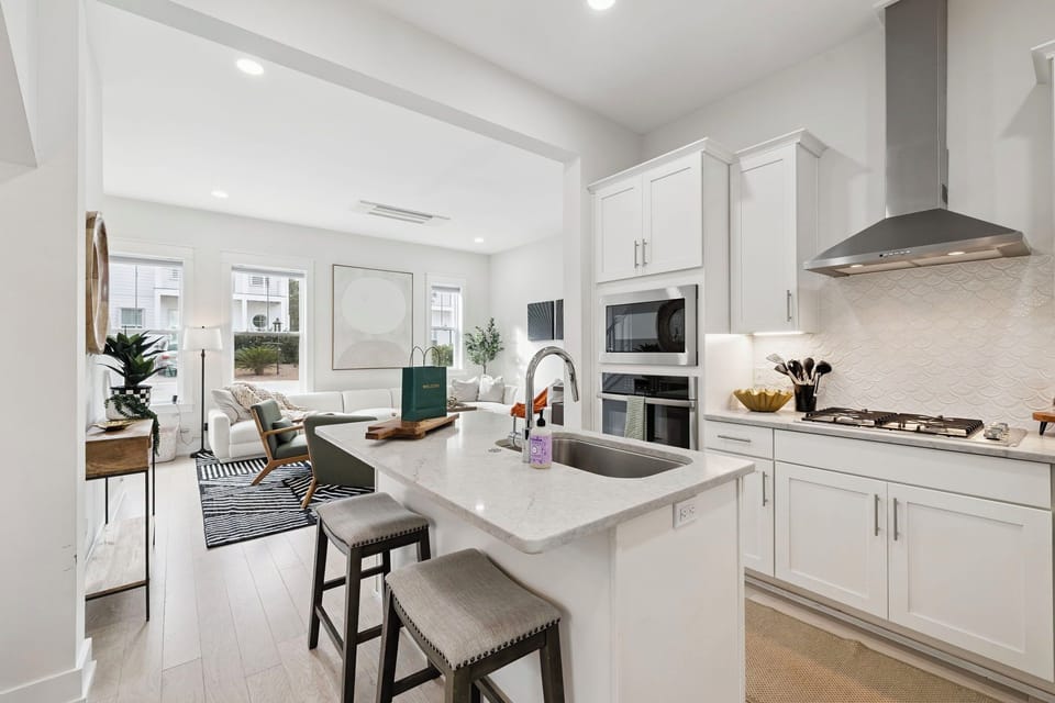 Fully equipped chef’s kitchen with large island seating