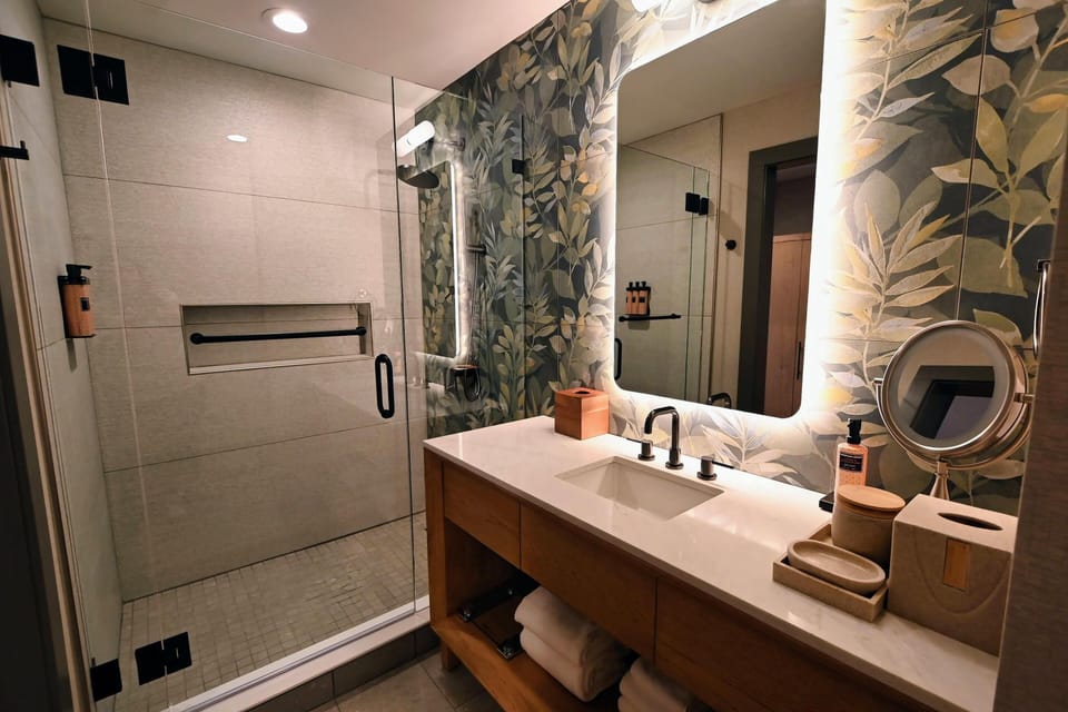 Designer toiletries, hair dryer, towels, soap