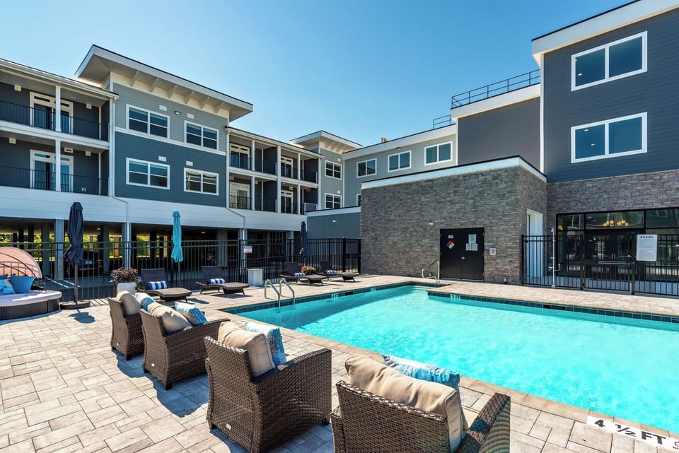 Upscale furnishings and a bright, inviting pool with sparkling water