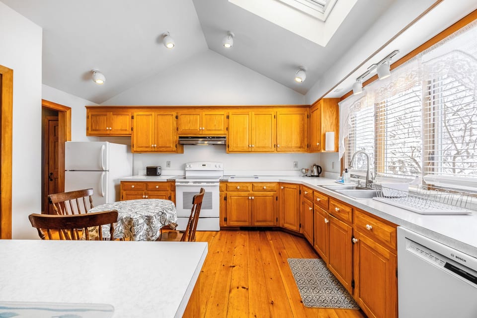 Signature Suite, 1 King Bed with Sofa bed, Non Smoking, Garden View | Private kitchen | Shared fridge