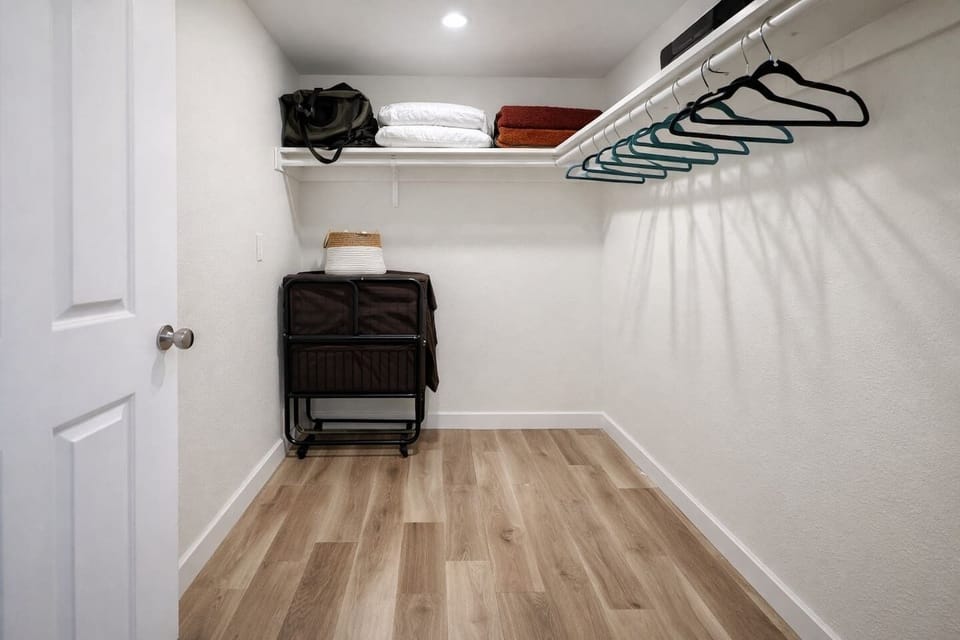 closet with roll away bed and inflatable mattresses 