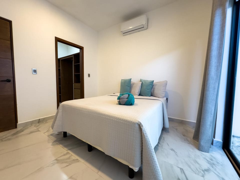 Bright, airy bedroom with modern comforts and natural light