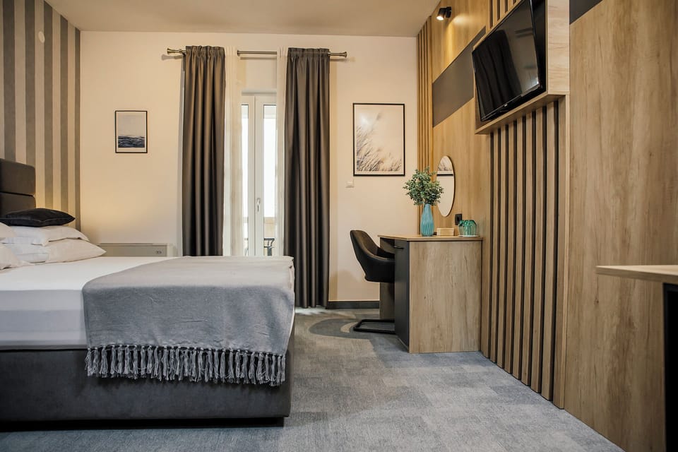 Deluxe Double or Twin Room, Balcony, Ocean View | In-room safe, blackout drapes, soundproofing, free WiFi