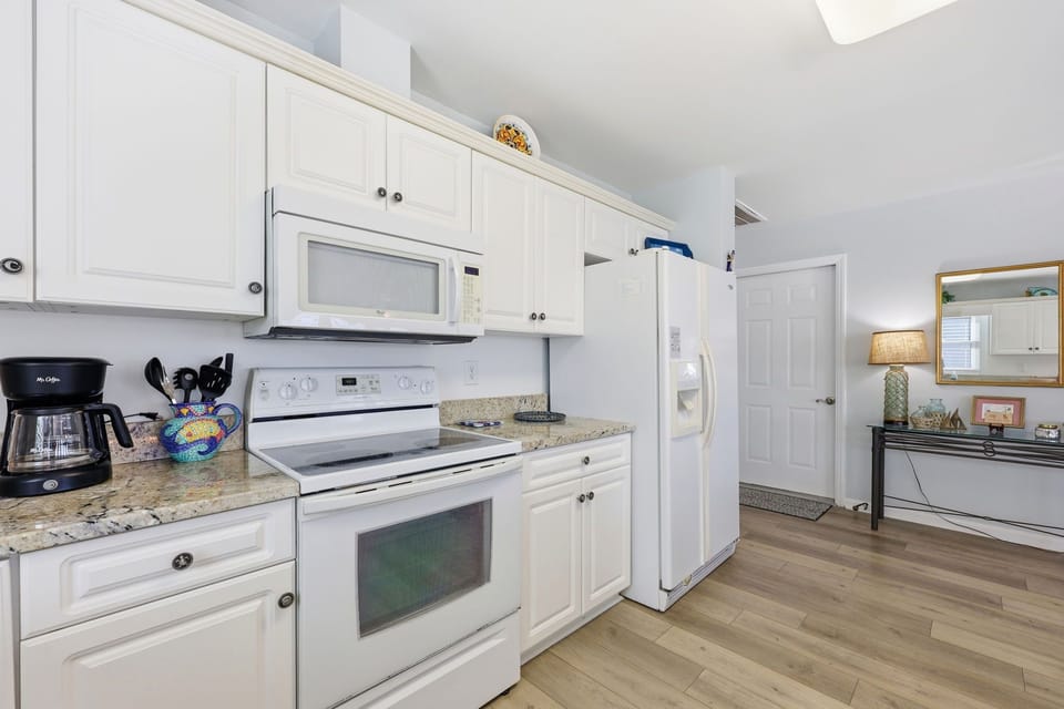 Your fully equipped kitchen features modern appliances, granite counters, and everything you need to prepare meals in comfort during your stay.