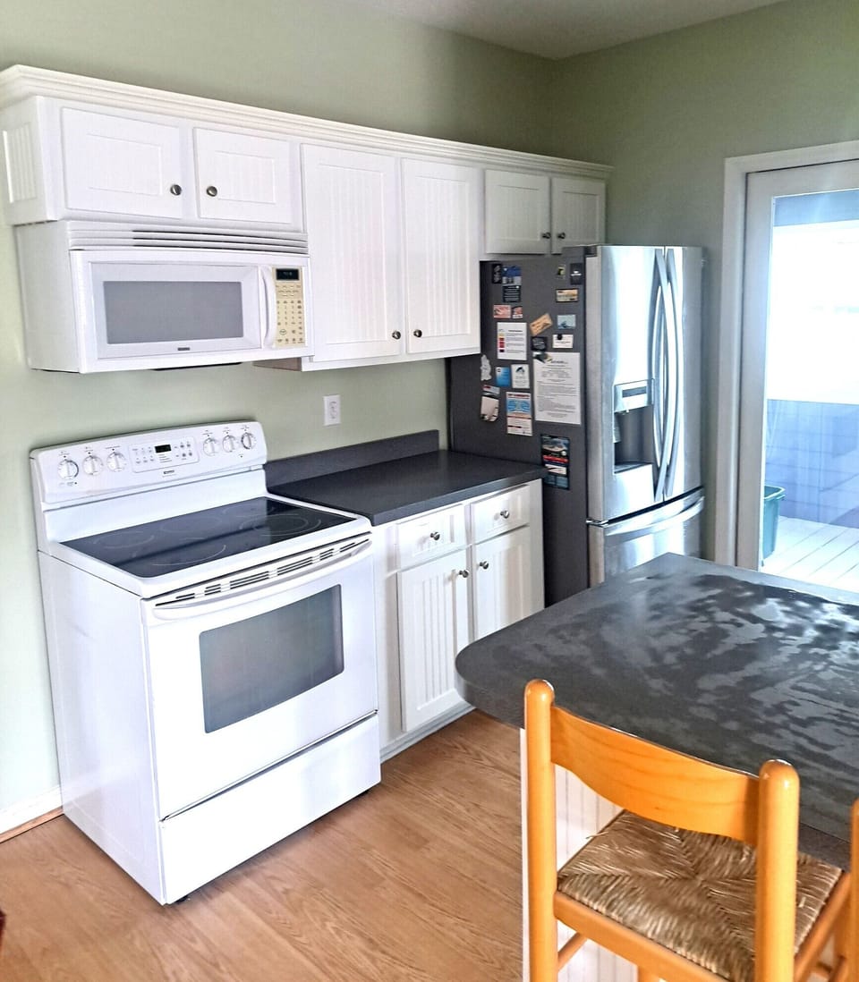 Your fully equipped kitchen features modern appliances and plenty of storage for preparing memorable meals during your stay.
