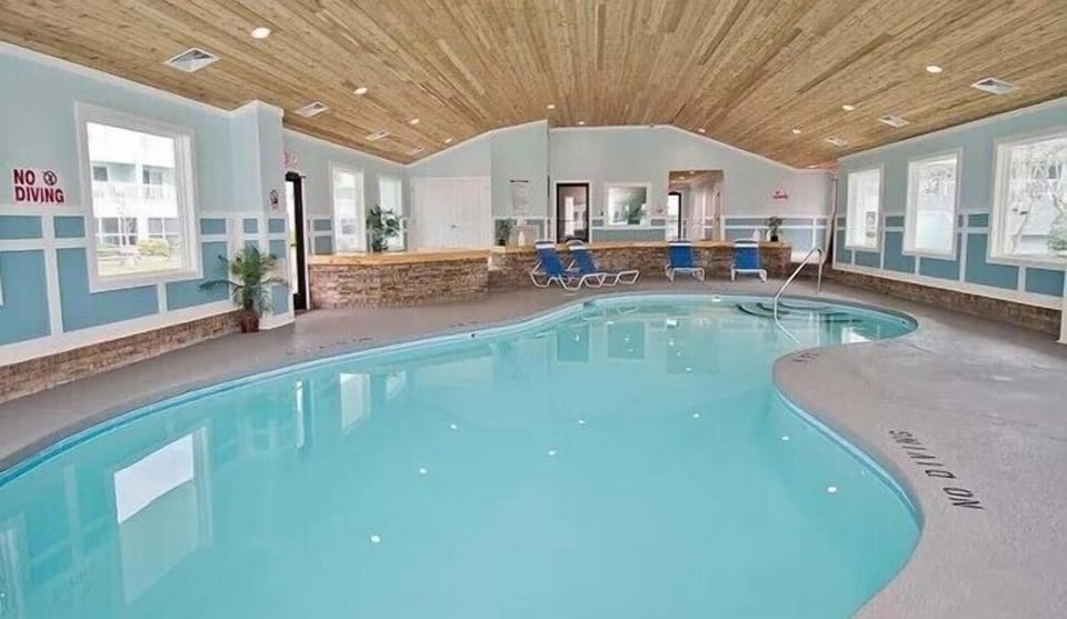 Indoor Pool- Heated indoor pool available year‑round, complete with restrooms and showers for all‑season comfort and convenience.