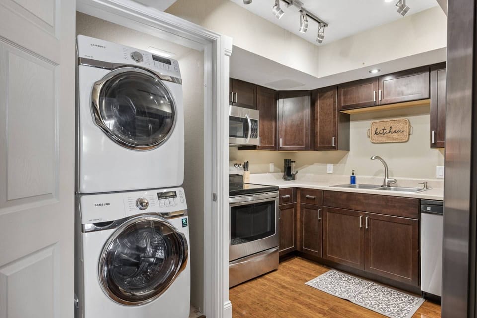 Full size stackable front loader Washer & Dryer inside the condo