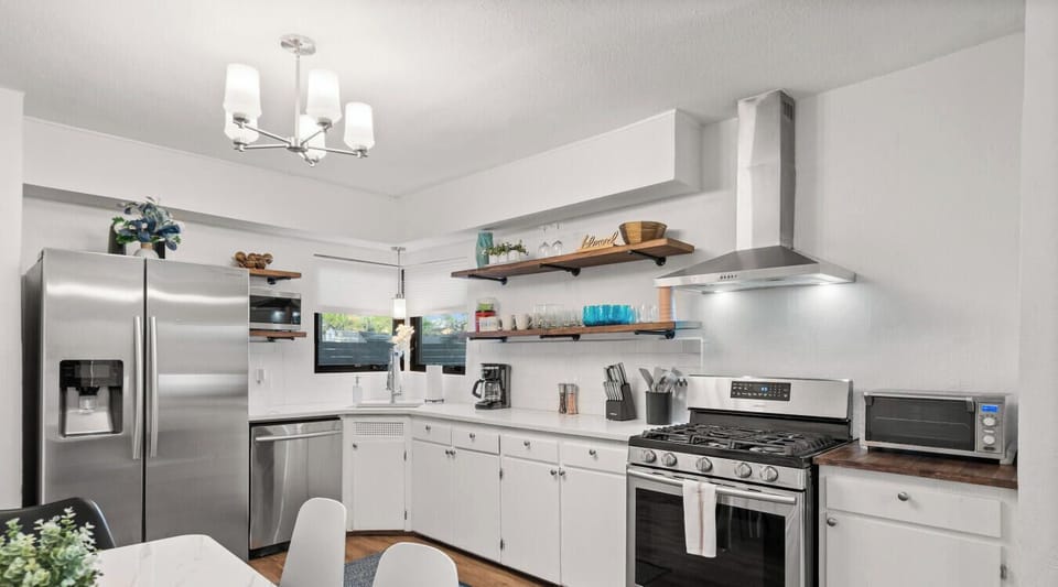 Brew your morning coffee or prep a full group dinner in this fully stocked kitchen with gas range and ample counter space.