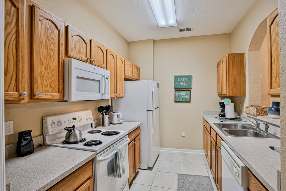 Condo, Multiple Beds, Pool Access, Garden View (Yellow Starfish - Windsor Hills) | Private kitchen