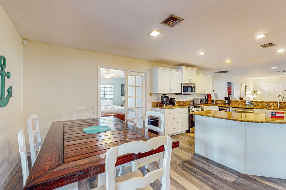 House, Multiple Beds, Kitchen (Lakefront Living) | 3 bedrooms, individually decorated, individually furnished, bed sheets