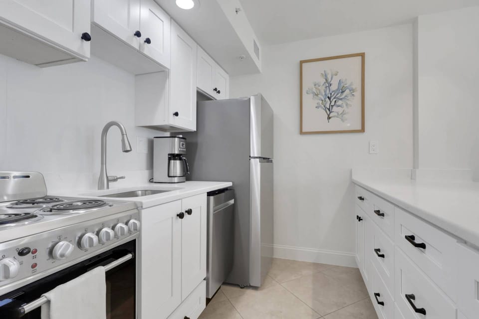 The kitchen is well equipped with an oven, frigerator/freezer, dishwasher and an available portable microwave.