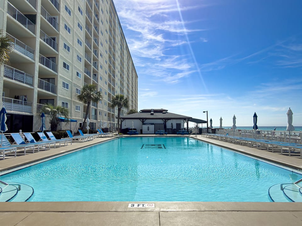Immerse yourself in the beachfront sparkling pool and get ready for the best day of relaxing!