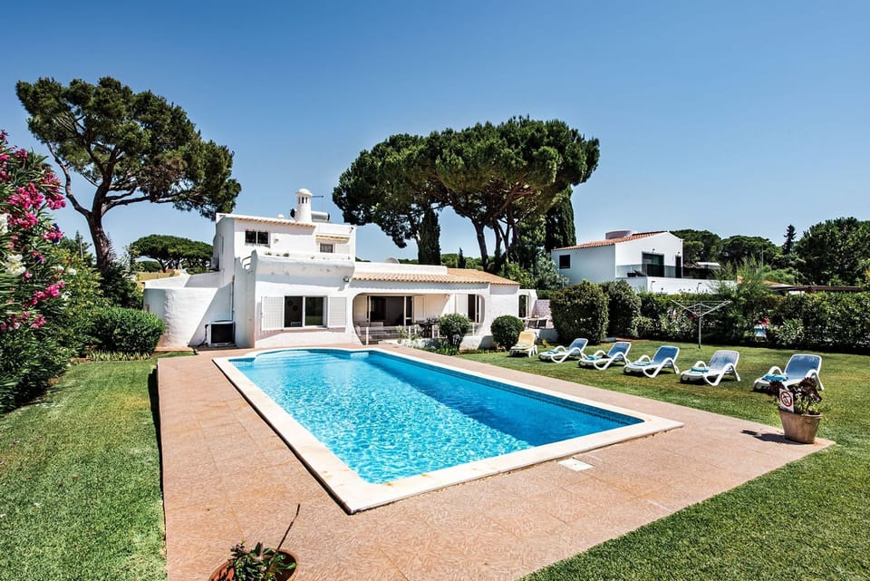 Sunny pool area and garden