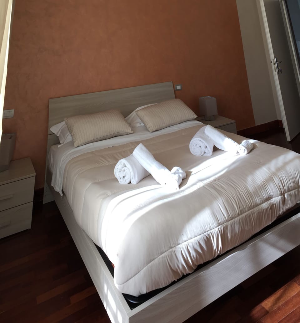 Premium bedding, down comforters, in-room safe, desk