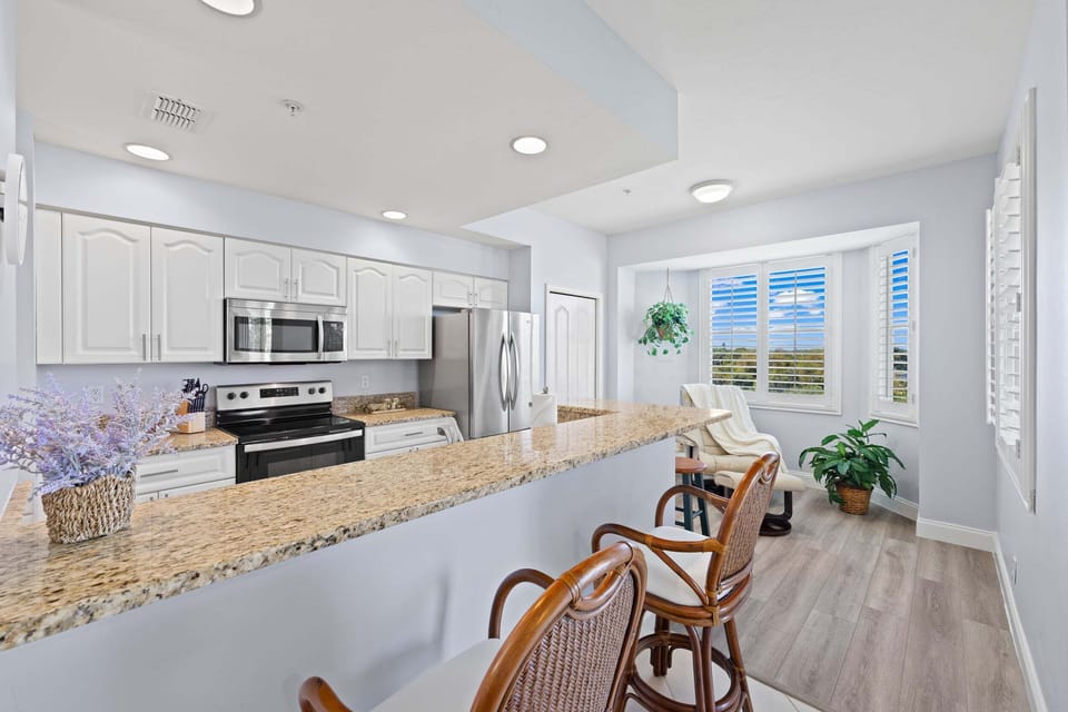 Open kitchen so you can cook while staying part of the conversation