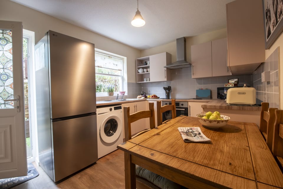 Ground floor: Kitchen leads out to the patio area