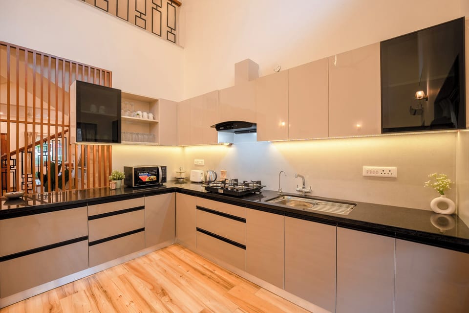 Villa, 4 Bedrooms, Balcony | Private kitchen | Electric kettle, dining tables