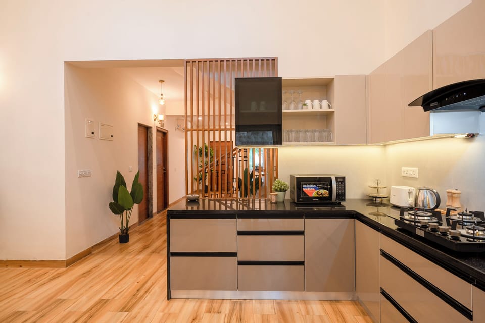 Villa, 4 Bedrooms, Balcony | Private kitchen | Electric kettle, dining tables