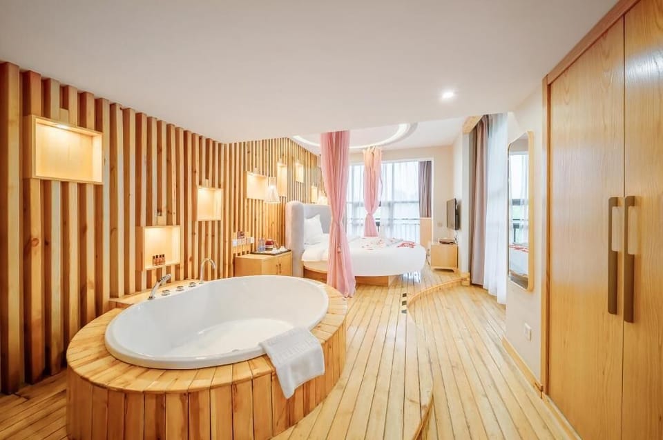 Double Room, Patio, City View | Bathroom | Combined shower/tub, rainfall showerhead, free toiletries, hair dryer