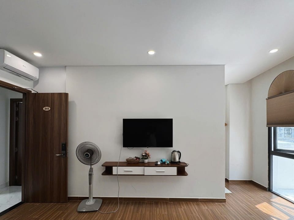 Standard Quadruple Room, City View | Blackout drapes, soundproofing, iron/ironing board, WiFi (free)