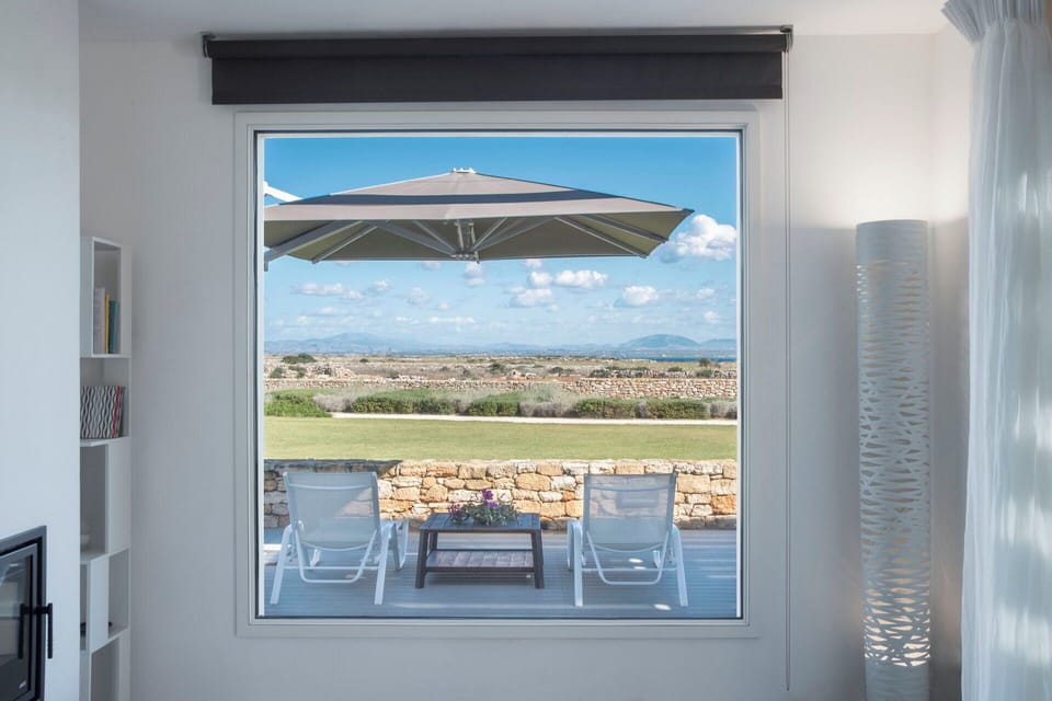 Furniture, Chair, Shade, Outdoor Furniture, Coast, Outdoor Table, Kitchen & Dining Room Table, Houseplant, Balcony, Eco Hotel