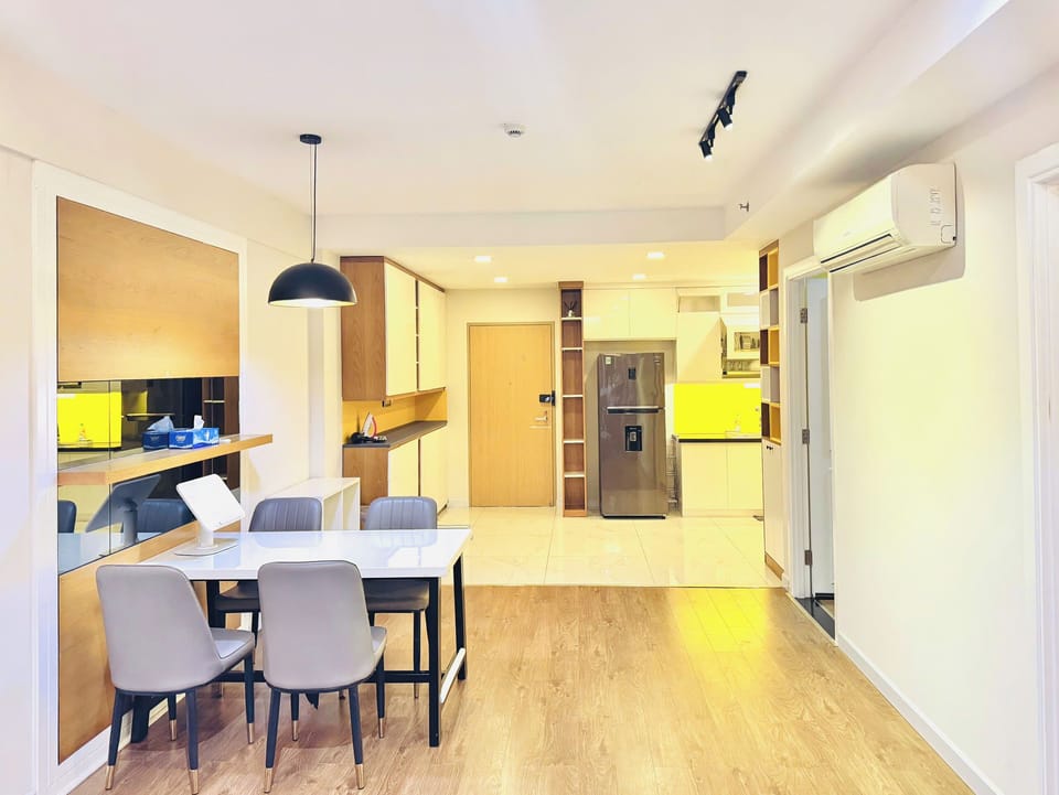 Family Apartment, 2 Bedrooms, City View | Living area | 55-inch Smart TV with satellite channels