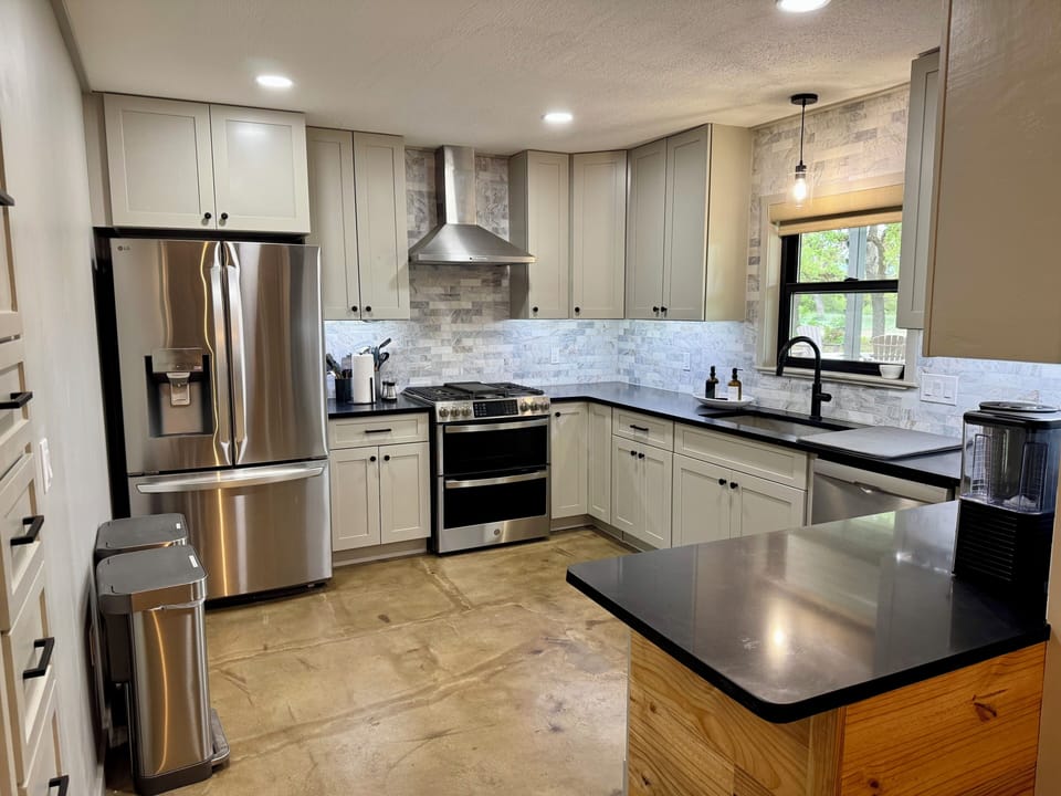 Fully stocked kitchen with everything you need other than food.