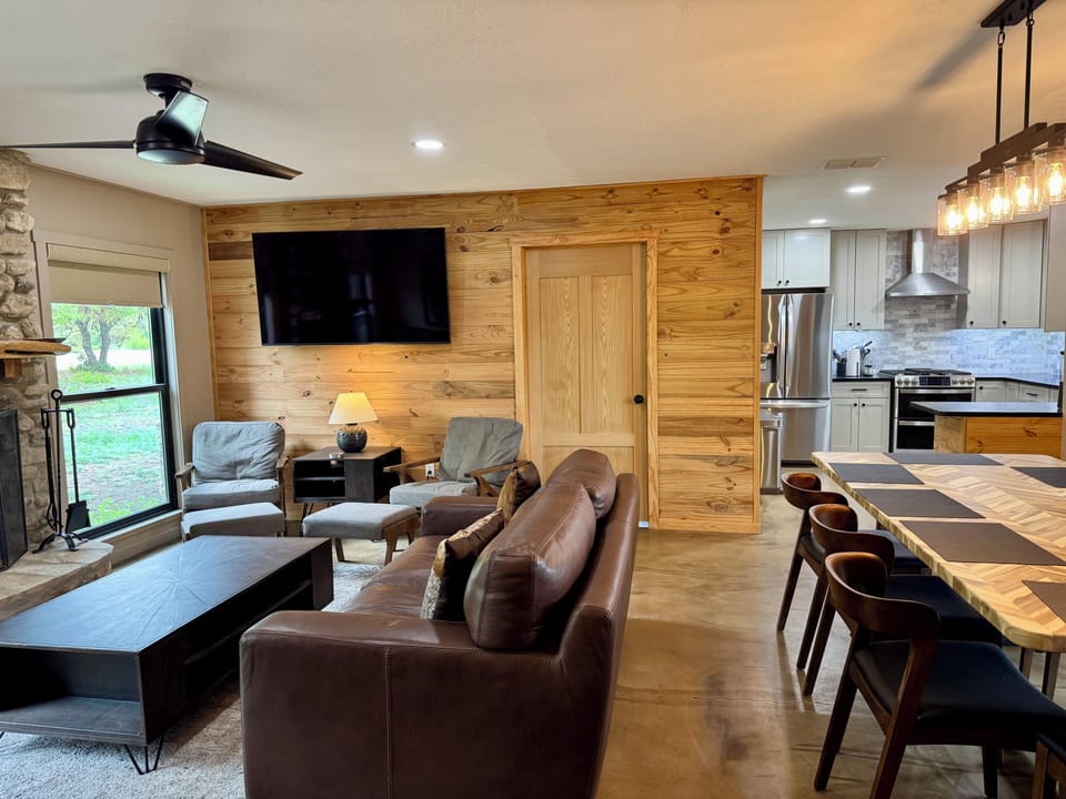 The living, dining and kitchen areas allow for fun gatherings with friends or family.