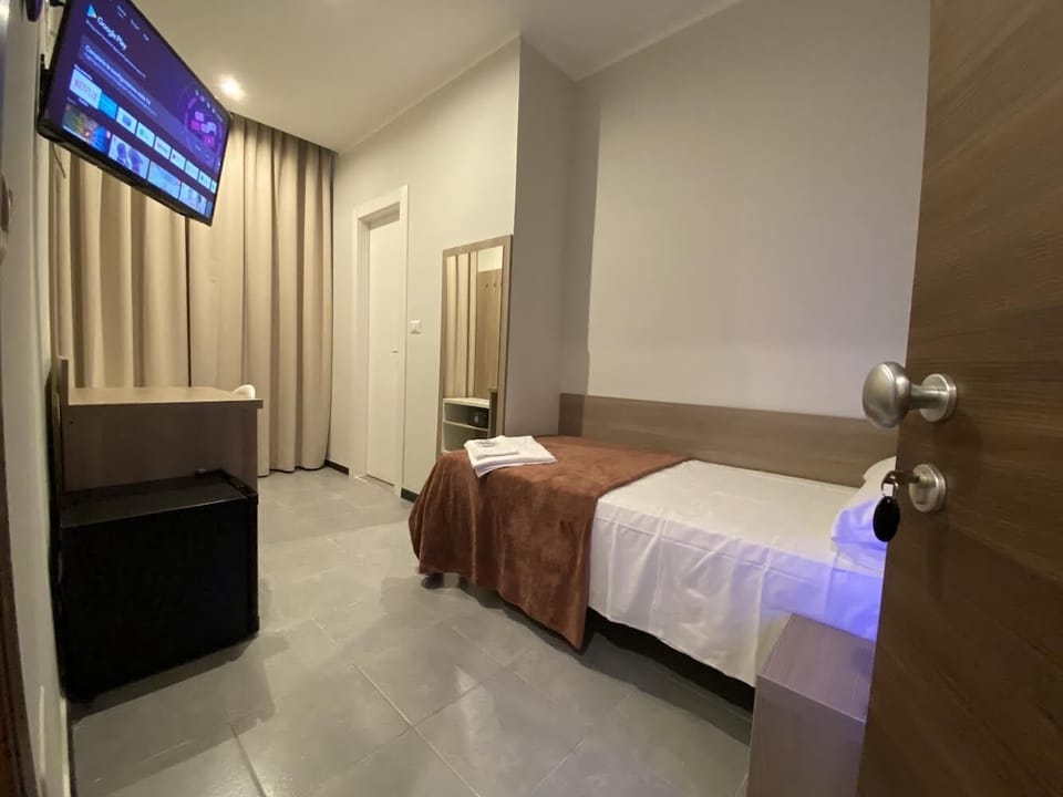 Standard Single Room | Premium bedding, down comforters, memory foam beds, desk