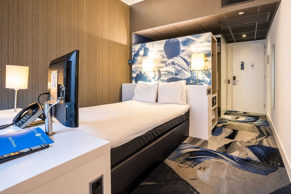 Recharge in a sleek, quiet room with crisp, clean lines.