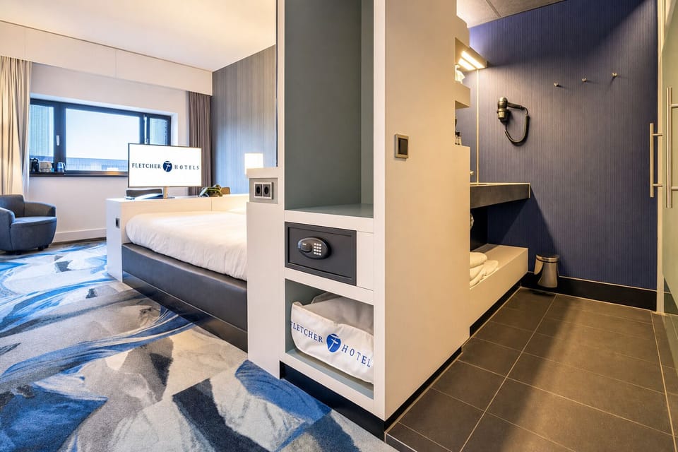 Unwind in a sleek suite with spa-style open bathroom.