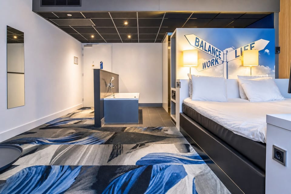 Stretch out in a spacious studio-style room with bold design.
