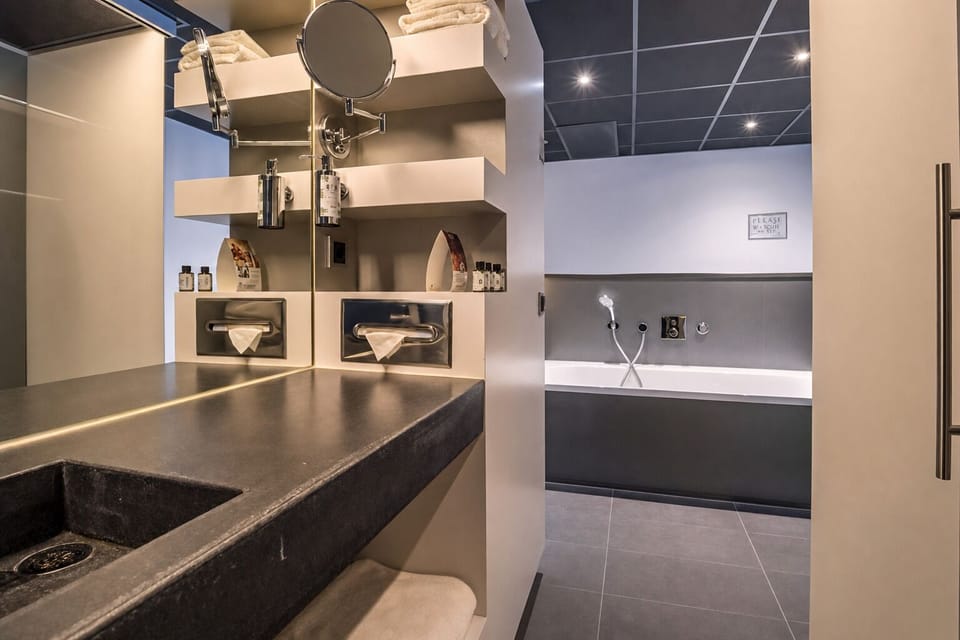 Indulge in spa-like rituals with generous counter space and light.