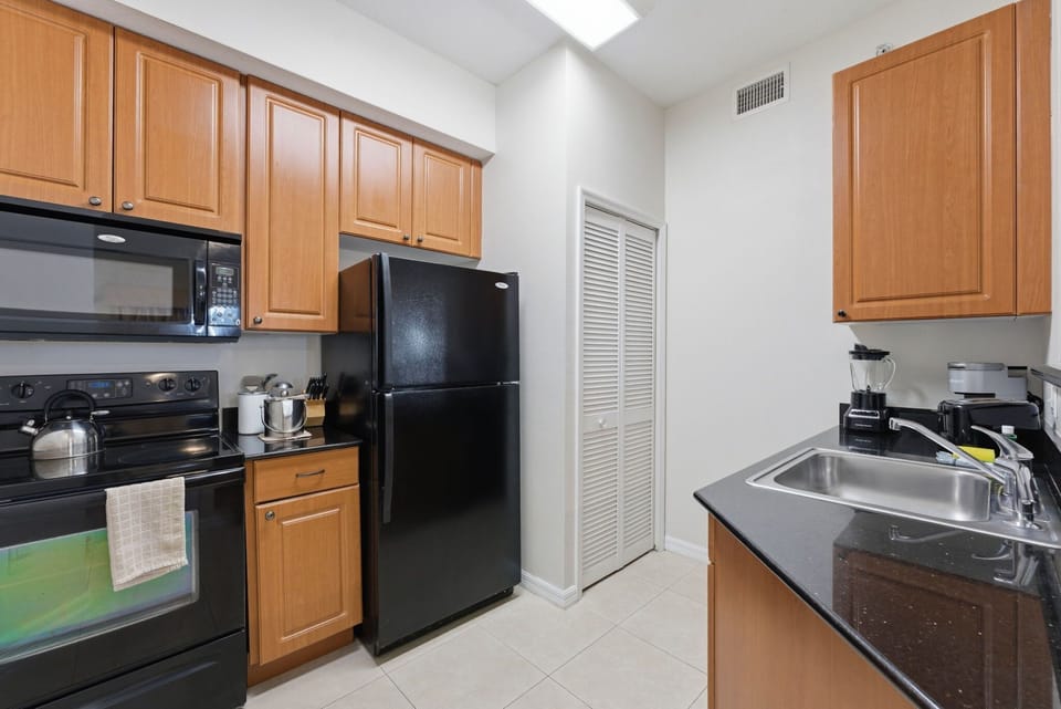 Apartment (1 Bedroom) | Private kitchen | Microwave, oven, stovetop, dishwasher