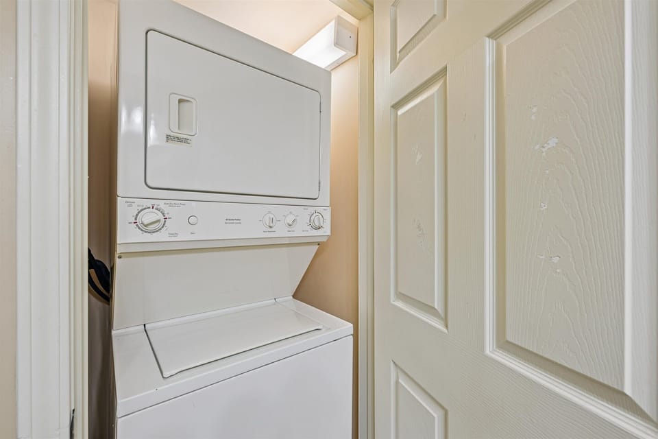 Your in-unit stacked washer and dryer provides convenient laundry access, making extended stays comfortable and hassle-free.